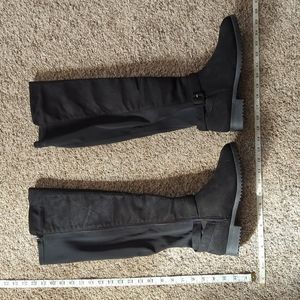 Black knee high boots.